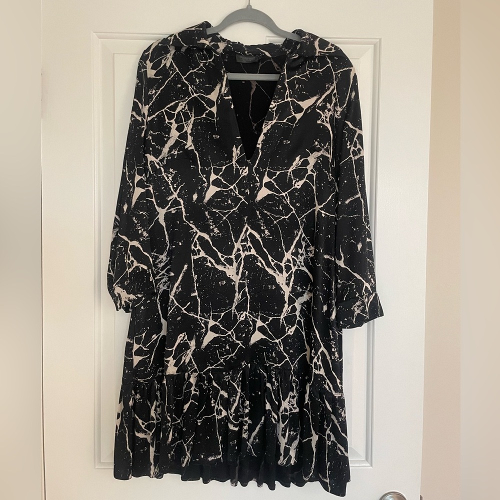 Black dress with marble print.